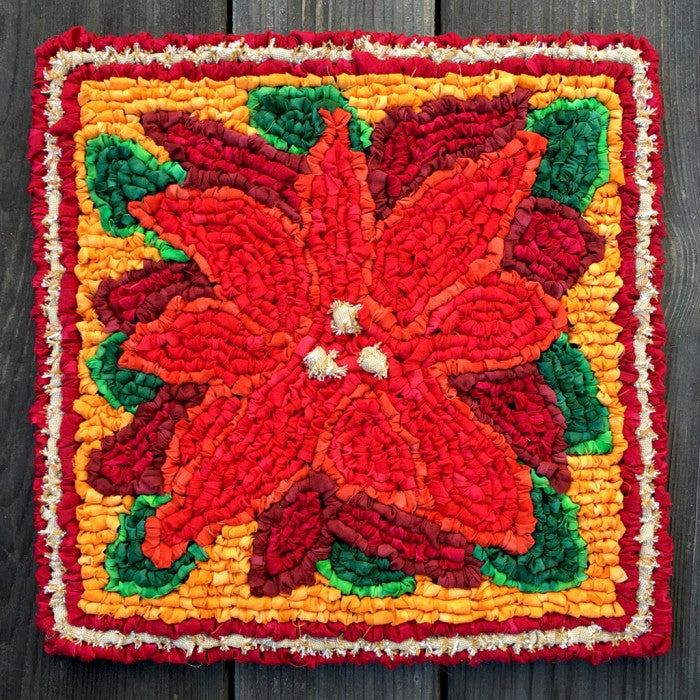 Locker Hooking a Vibrant Poinsettia Mat