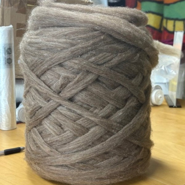 Close view of taupe Romney carded wool sliver