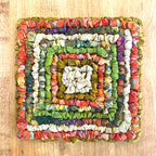 Locker Hooked Coaster in autumn colored hand dyed cotton fabric strips on 3.75 Mesh Canvas.