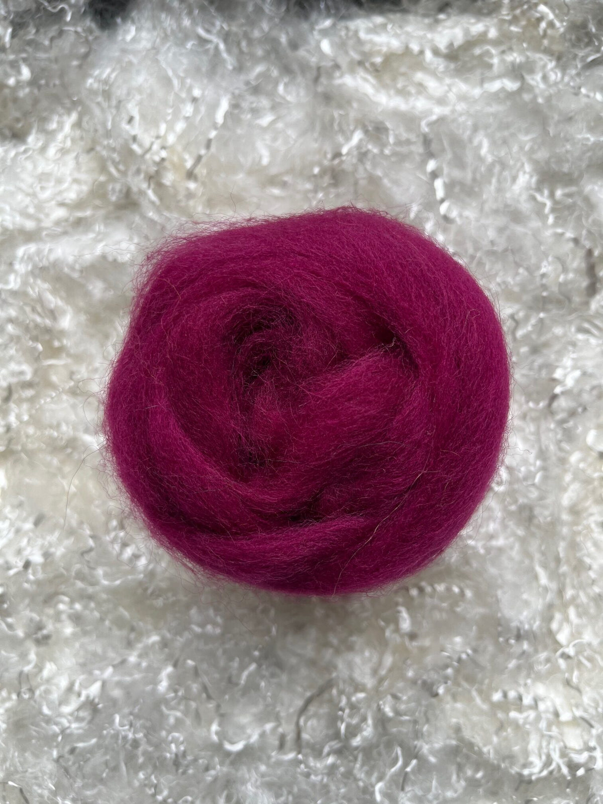 Magenta dyed Corriedale wool top roving