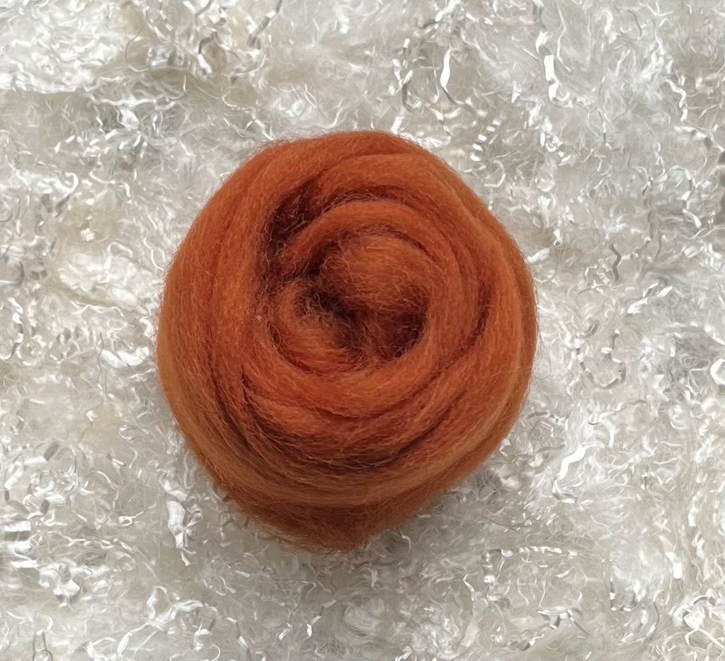 Rust dyed Corriedale wool top roving