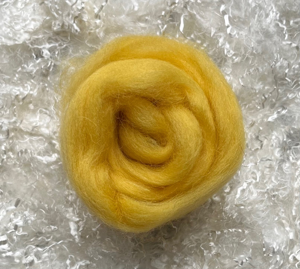 Yellow dyed Corriedale wool top roving