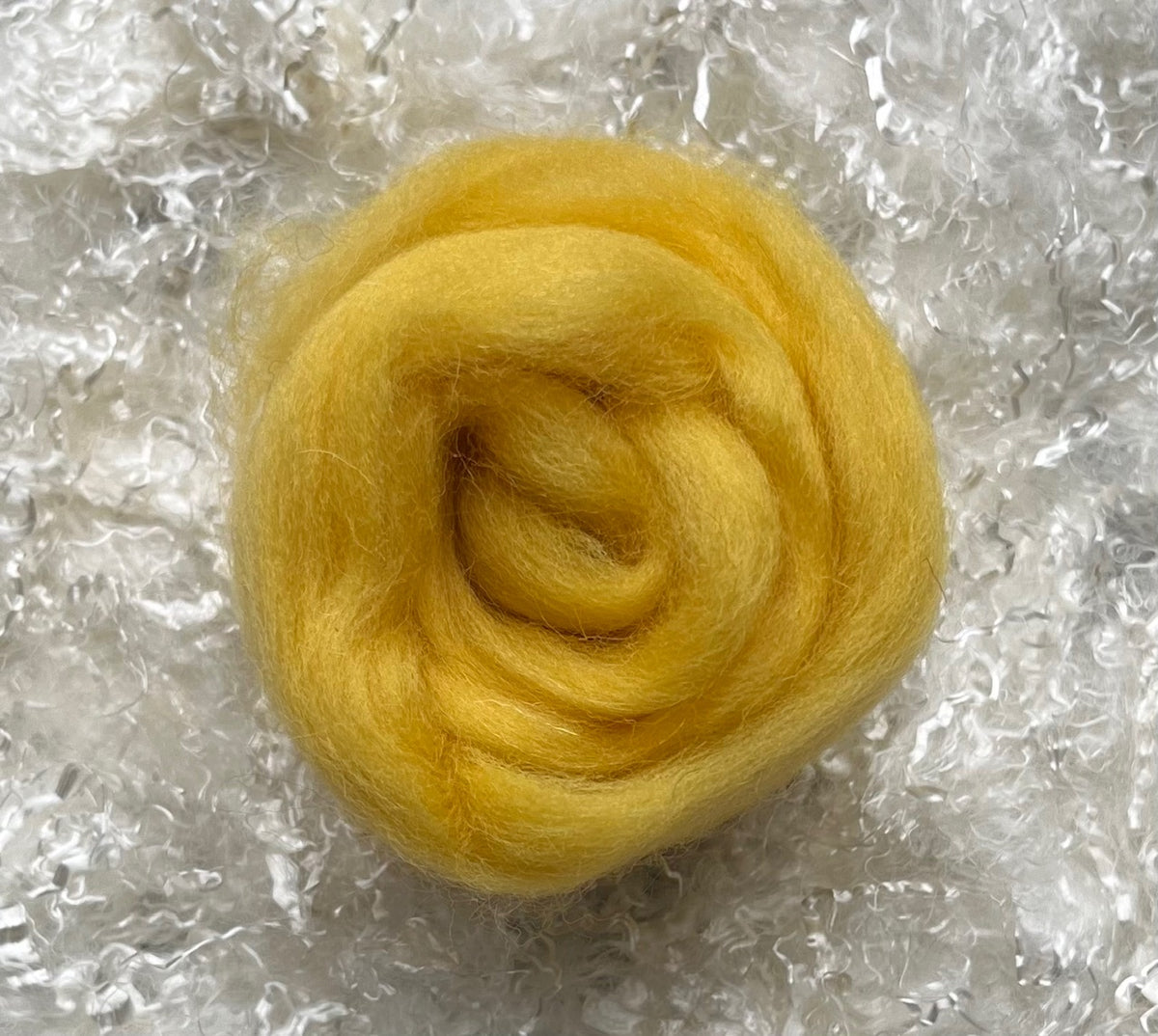 Yellow dyed Corriedale wool top roving
