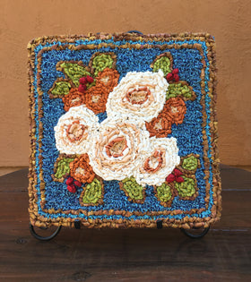 Locker Hooking - Color Crazy locker hooked winter bouquet. Locker hooking kit available on colorcrazy.com